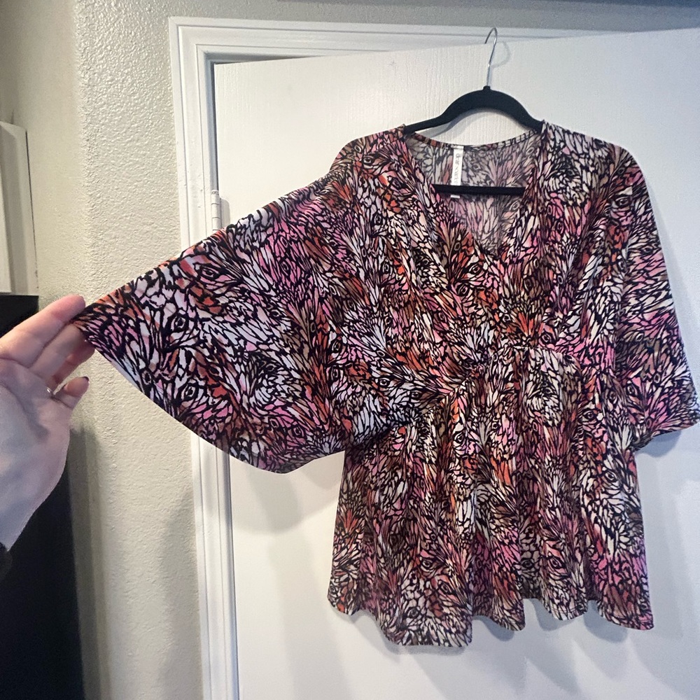 dear Scarlett flutter by top. Silly polyester spandex. Sz M Like new condition.